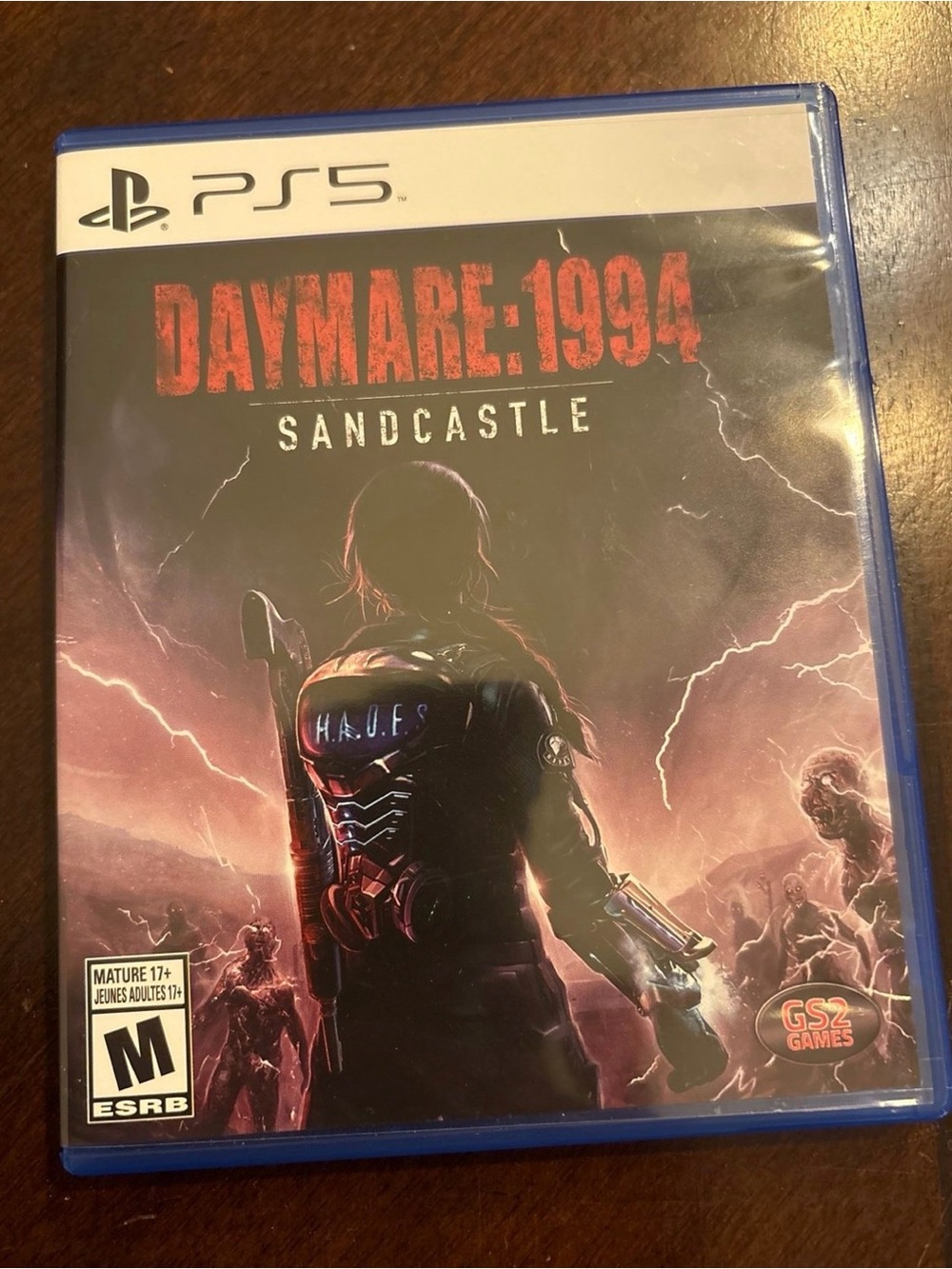 Sony PS5 Daymare: 1994 Sandcastle – Black & Red Cover Art